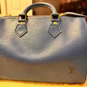 LV Boston color blue it’s nothing wrong. I think it’s 20 inches long